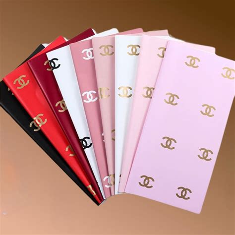 chanel gift wrapping paper|Chanel flower wrapping paper.